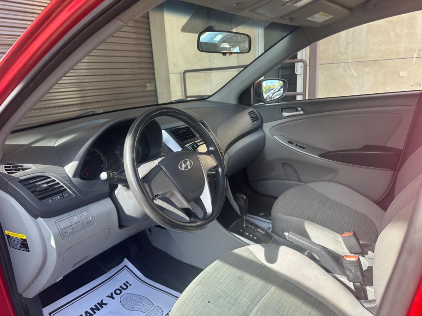 2015 Red /Gray Hyundai Accent GLS Sedan 4D (KMHCT4AE2FU) with an 4-Cyl, 1.6L engine, Auto, 6-Spd w/Overdrive transmission, located at 30 S. Berkeley Avenue, Pasadena, CA, 91107, (626) 248-7567, 34.145447, -118.109398 - The 2015 Hyundai Accent 4-Door Sedan stands as a testament to Hyundai's commitment to quality, efficiency, and value. Located in Pasadena, CA, our dealership specializes in providing a wide range of used BHPH (Buy Here Pay Here) cars, trucks, SUVs, and vans, including the remarkable Hyundai Accent. - Photo#19